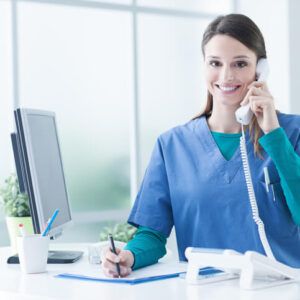 A student seeking a medical office specialist career at the clinic front desk